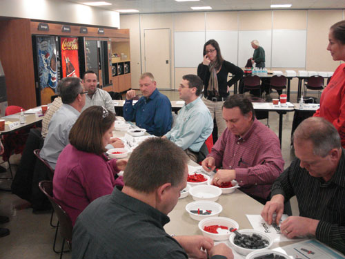 Participants in a consortium session hosted by Silfex.